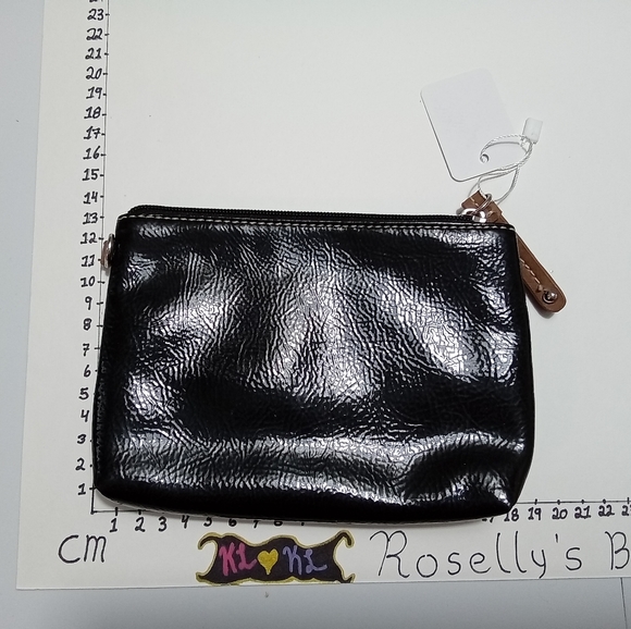 Small black clutch. No tags. Material unknown . Zipper in great condition. - Picture 2 of 3